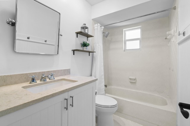 bathroom with toilet, shower / bath combo with shower curtain, and vanity
