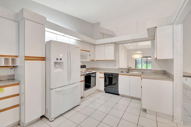 6078 Sunny Pointe Cir, Delray Beach, FL 33484 - kitchen with white appliances, a sink, light countertops, lofted ceiling, and white cabinets