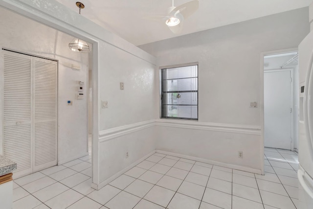 6078 Sunny Pointe Cir, Delray Beach, FL 33484 - unfurnished dining area featuring light tile patterned flooring and ceiling fan