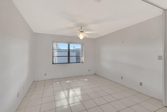 6078 Sunny Pointe Cir, Delray Beach, FL 33484 - spare room with a ceiling fan and light tile patterned floors