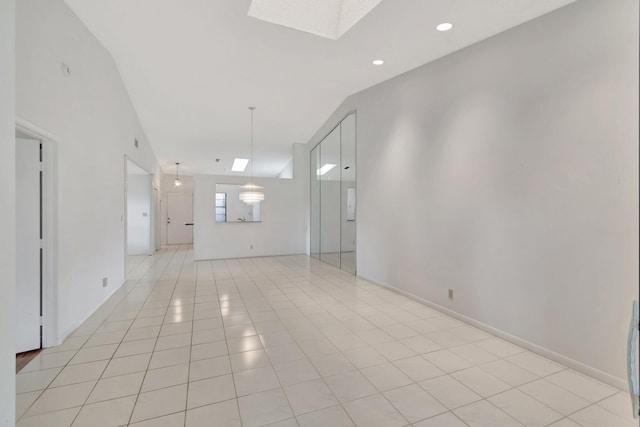 6078 Sunny Pointe Cir, Delray Beach, FL 33484 - unfurnished room with a skylight, light tile patterned flooring, and recessed lighting
