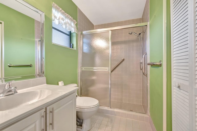 6078 Sunny Pointe Cir, Delray Beach, FL 33484 - bathroom featuring a stall shower, tile patterned flooring, toilet, and vanity