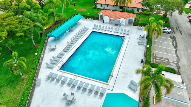 6078 Sunny Pointe Cir, Delray Beach, FL 33484 - community pool with fence and a patio