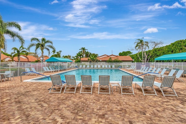 6078 Sunny Pointe Cir, Delray Beach, FL 33484 - community pool featuring fence and a patio