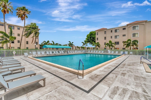 6078 Sunny Pointe Cir, Delray Beach, FL 33484 - community pool with fence and a patio area