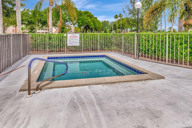 6078 Sunny Pointe Cir, Delray Beach, FL 33484 - view of pool featuring fence and a pool