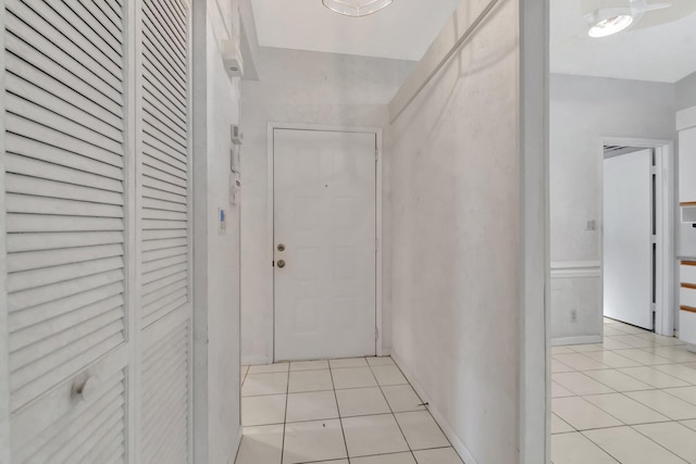 6078 Sunny Pointe Cir, Delray Beach, FL 33484 - corridor featuring light tile patterned floors