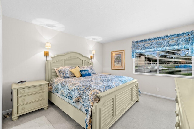 234 Pine Hov Cir Unit B-1, Greenacres, FL 33463 - bedroom featuring light colored carpet and baseboards