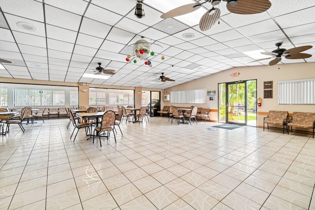 234 Pine Hov Cir Unit B-1, Greenacres, FL 33463 - dining room with ceiling fan, a paneled ceiling, light tile patterned floors, and lofted ceiling