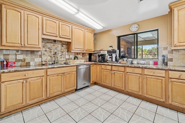 234 Pine Hov Cir Unit B-1, Greenacres, FL 33463 - kitchen featuring stainless steel dishwasher, a sink, decorative backsplash, light stone counters, and light brown cabinets