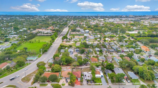 339 NW 5th Ave, Delray Beach, FL 33444 - aerial overview of property's location with a large body of water and nearby suburban area