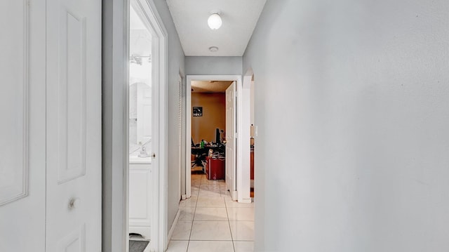 339 NW 5th Ave, Delray Beach, FL 33444 - hallway with light tile patterned floors