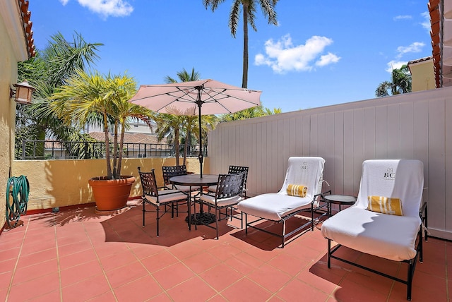 301 Australian Ave Unit 305, Palm Beach, FL 33480 - view of patio / terrace featuring fence