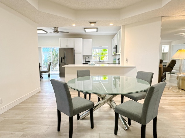 11666 Briarwood Cir Unit 1, Boynton Beach, FL 33437 - dining room with a ceiling fan, light wood-style floors, healthy amount of natural light, baseboards, and recessed lighting