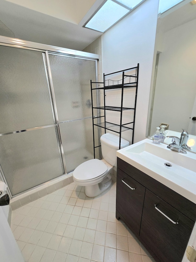 20975 Del Casa Dr, Boca Raton, FL 33433 - full bathroom with tile patterned flooring, a shower stall, toilet, and vanity