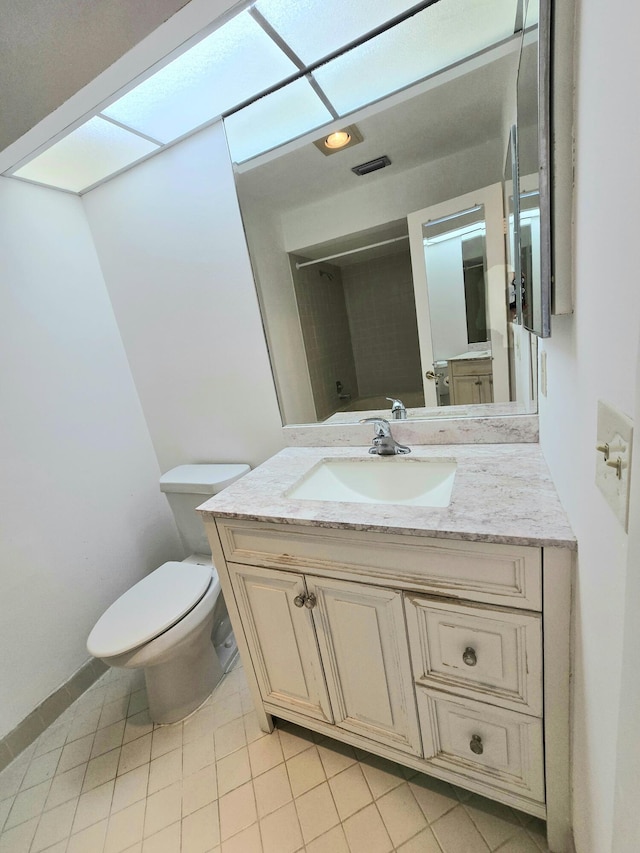 20975 Del Casa Dr, Boca Raton, FL 33433 - bathroom with toilet, tile patterned flooring, vanity, and baseboards