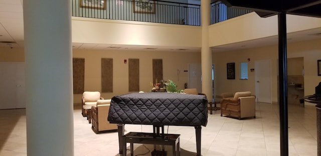 community lobby featuring a high ceiling