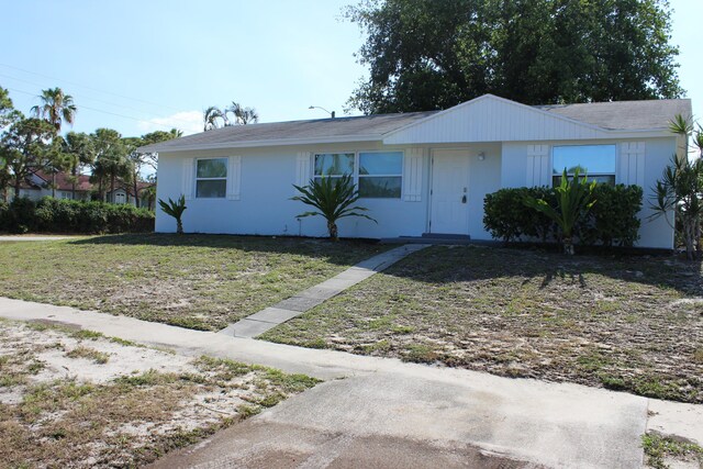 view of front of home with a front yard