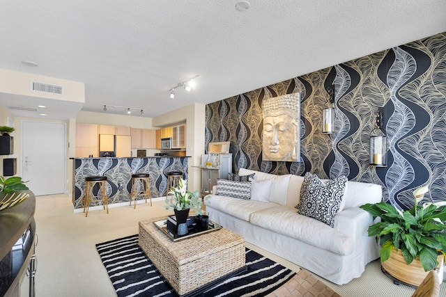 1551 N Flagler Dr Unit 804, West Palm Beach, FL 33401 - living room with wallpapered walls