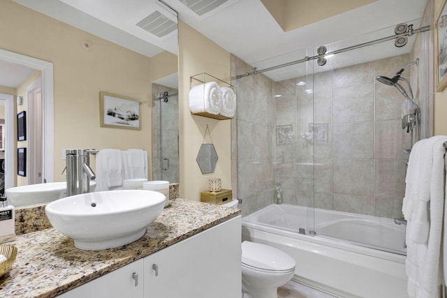 1551 N Flagler Dr Unit 804, West Palm Beach, FL 33401 - full bath featuring vanity, toilet, and shower / bath combination with glass door