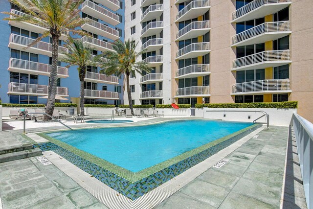 1551 N Flagler Dr Unit 804, West Palm Beach, FL 33401 - community pool with a patio