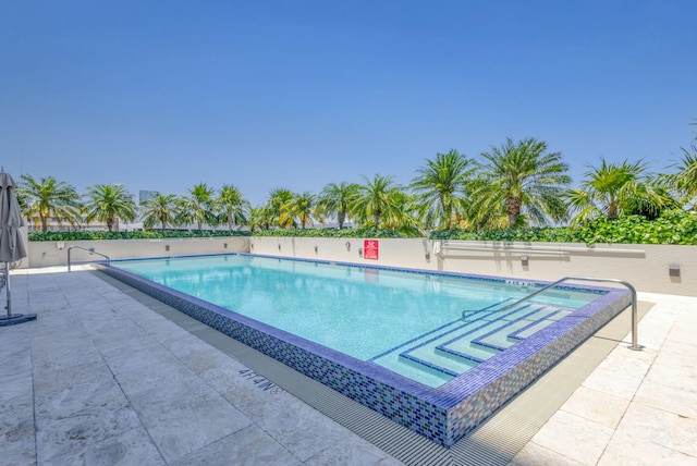 1551 N Flagler Dr Unit 804, West Palm Beach, FL 33401 - community pool featuring a patio area