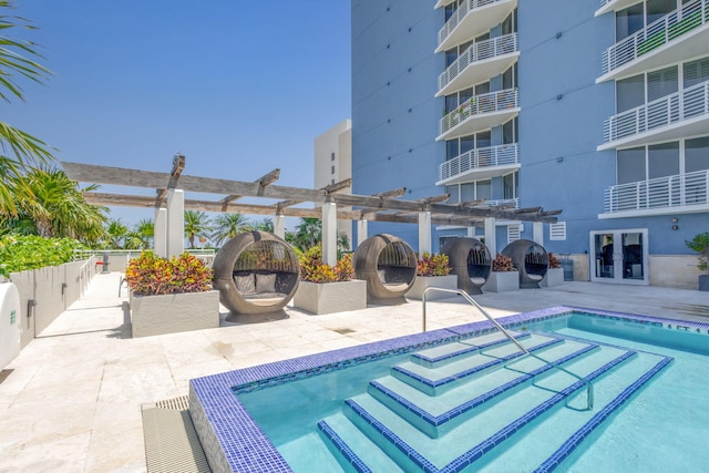 1551 N Flagler Dr Unit 804, West Palm Beach, FL 33401 - view of pool featuring a pergola, a patio, and french doors