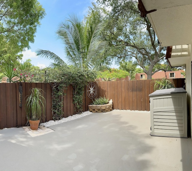 3400 Spanish Wells Dr Unit 52-C, Delray Beach, FL 33445 - fenced backyard featuring a patio area