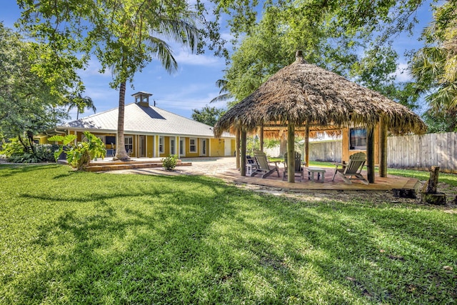 3020 SE St Lucie Blvd, Stuart, FL 34997 - back of property featuring a gazebo and a patio