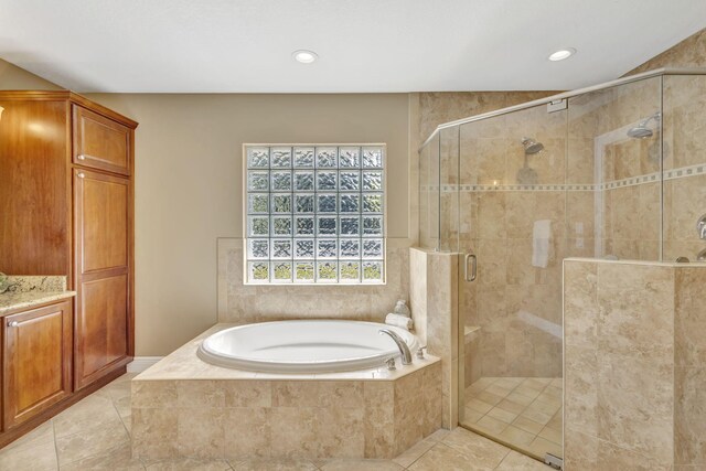3020 SE St Lucie Blvd, Stuart, FL 34997 - full bath with a garden tub, a shower stall, recessed lighting, and tile patterned flooring