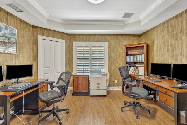 3020 SE St Lucie Blvd, Stuart, FL 34997 - home office featuring crown molding, light wood finished floors, baseboards, wallpapered walls, and a raised ceiling