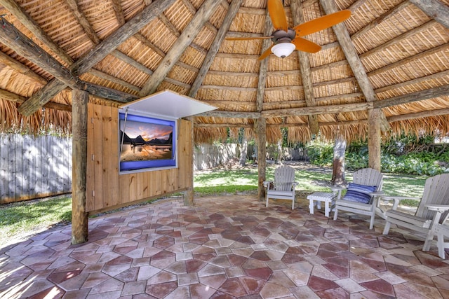 3020 SE St Lucie Blvd, Stuart, FL 34997 - view of patio / terrace featuring a gazebo, a ceiling fan, and fence