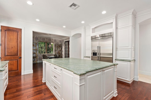 12891 Inshore Dr, Palm Beach Gardens, FL 33410 - kitchen featuring built in refrigerator, open shelves, baseboards, a center island, and dark wood-type flooring