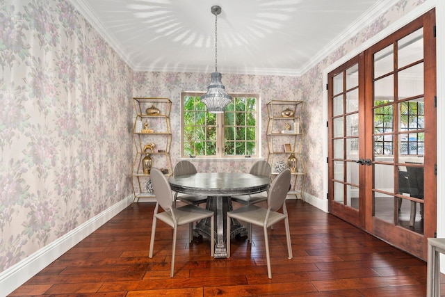 12891 Inshore Dr, Palm Beach Gardens, FL 33410 - dining space with french doors, wallpapered walls, hardwood / wood-style flooring, crown molding, and baseboards