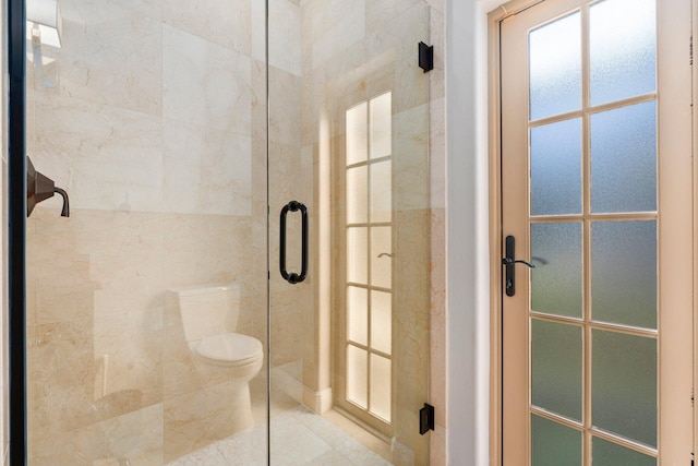 12891 Inshore Dr, Palm Beach Gardens, FL 33410 - full bathroom with a stall shower and toilet