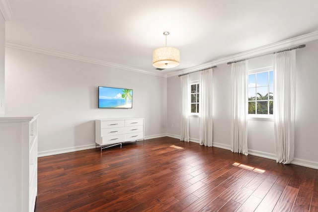 12891 Inshore Dr, Palm Beach Gardens, FL 33410 - unfurnished bedroom featuring wood finished floors, ornamental molding, and baseboards