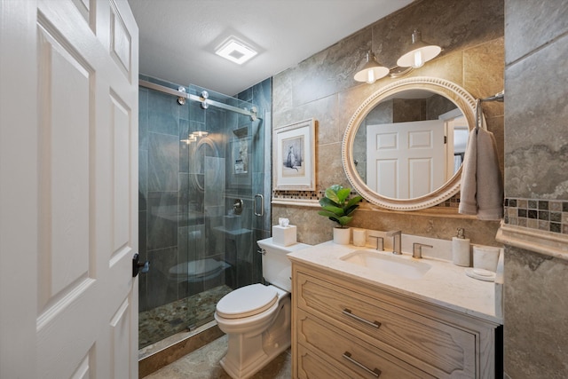 17315 Orange Blvd, Loxahatchee, FL 33470 - full bathroom with tile walls, a stall shower, toilet, and vanity