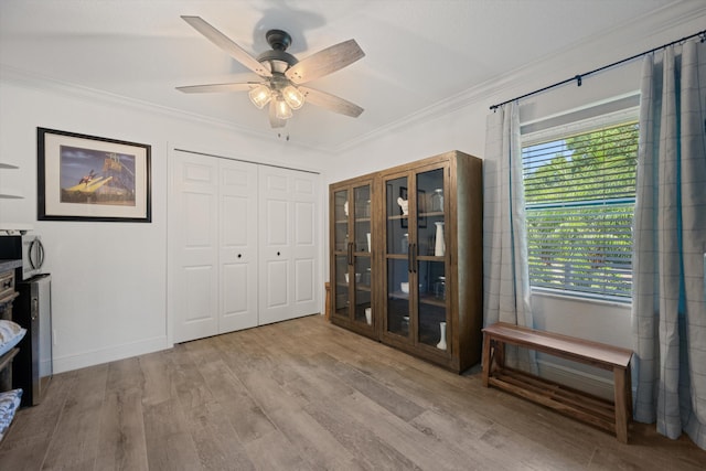 17315 Orange Blvd, Loxahatchee, FL 33470 - office area with crown molding, ceiling fan, and wood finished floors