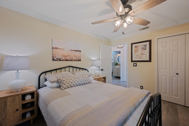 17315 Orange Blvd, Loxahatchee, FL 33470 - bedroom with crown molding, a closet, wood finished floors, and ceiling fan