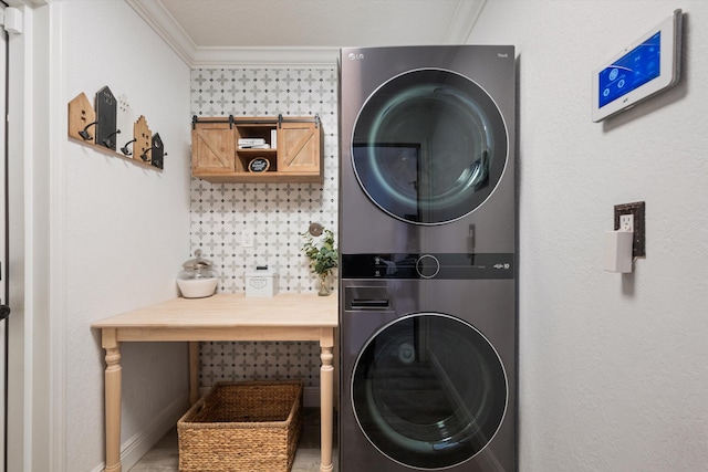 17315 Orange Blvd, Loxahatchee, FL 33470 - washroom with stacked washer and clothes dryer, crown molding, and baseboards