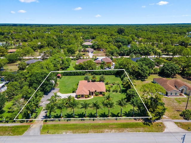 17315 Orange Blvd, Loxahatchee, FL 33470 - aerial view of property's location with a heavily wooded area and property parcel outlined