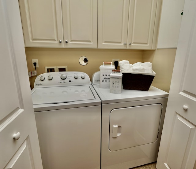 11296 SW Barton Way, Port Saint Lucie, FL 34987 - laundry area featuring independent washer and dryer and cabinet space