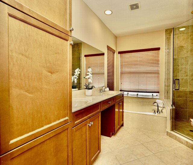 11296 SW Barton Way, Port Saint Lucie, FL 34987 - full bath with a stall shower, a garden tub, double vanity, tile patterned floors, and recessed lighting
