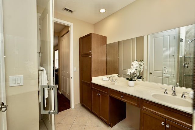 11296 SW Barton Way, Port Saint Lucie, FL 34987 - bathroom with double vanity, tile patterned flooring, and a stall shower