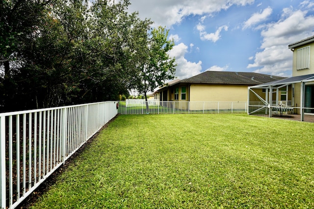 11296 SW Barton Way, Port Saint Lucie, FL 34987 - fenced backyard featuring a sunroom