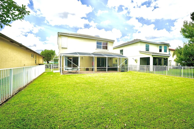 11296 SW Barton Way, Port Saint Lucie, FL 34987 - back of house with a fenced backyard, a patio area, a lanai, and stucco siding