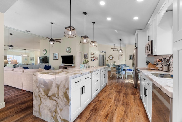 7884 Travlers Tree Dr, Boca Raton, FL 33433 - kitchen featuring appliances with stainless steel finishes, a ceiling fan, dark wood-style flooring, recessed lighting, and white cabinets
