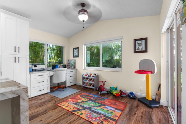 7884 Travlers Tree Dr, Boca Raton, FL 33433 - office space featuring ceiling fan, dark wood finished floors, lofted ceiling, and baseboards