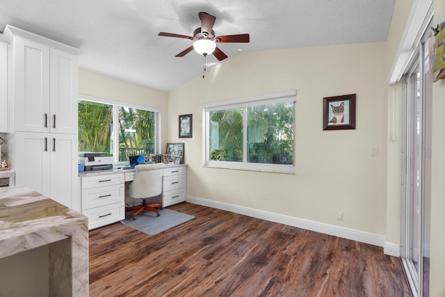 7884 Travlers Tree Dr, Boca Raton, FL 33433 - office with dark wood-style floors, vaulted ceiling, ceiling fan, and baseboards