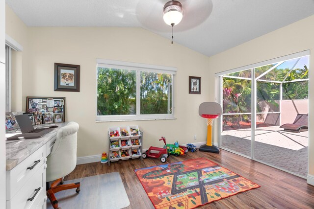 7884 Travlers Tree Dr, Boca Raton, FL 33433 - office featuring ceiling fan, plenty of natural light, baseboards, lofted ceiling, and wood finished floors